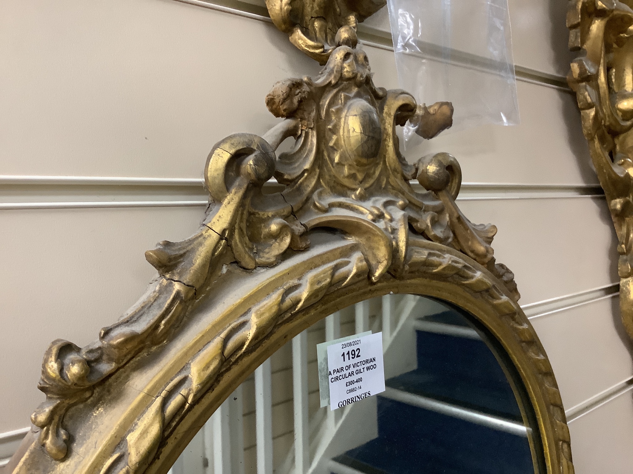 A pair of Victorian circular gilt wood and gesso wall mirrors. W-44, H-64cm.